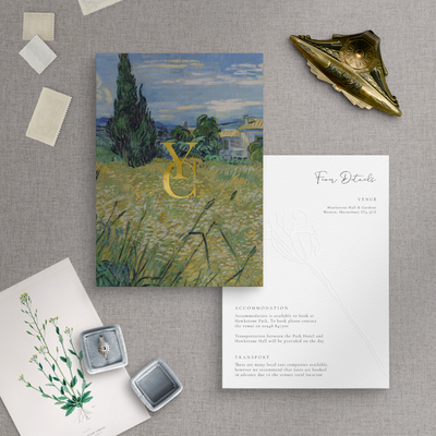 Gold foiled monogram on countryside wedding invitation flatlay on embossed information card - designed by The Little Paper Shop