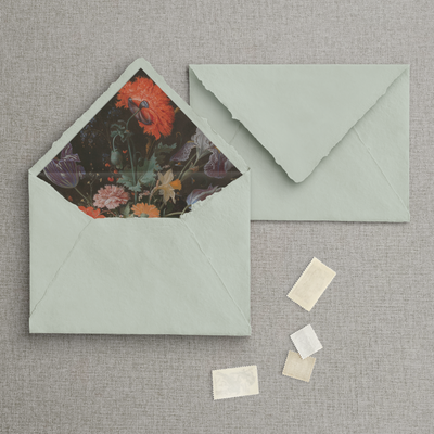 Lined sage raw edge handmade paper envelope with floral liner. Designed by The Little Paper Shop