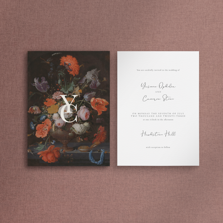 White monogram on floral wedding invitation next to the reverse view with invitation details. Designed by The Little Paper Shop