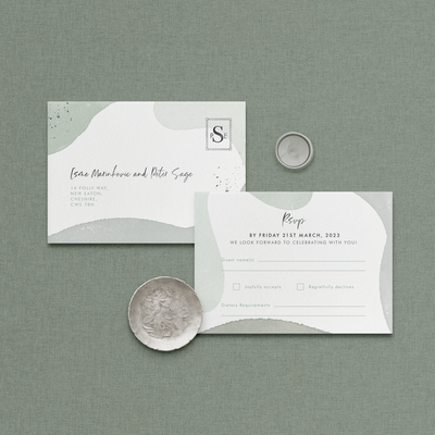 Wedding stationery flatlay of organic shape Sofia RSVP card designed by The Little Paper Shop