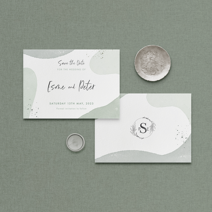 Wedding stationery flatlay of organic shape Sofia save the date card designed by The Little Paper Shop