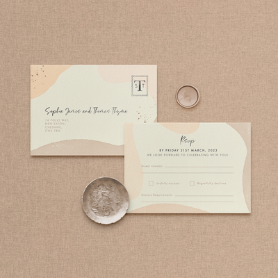 Wedding stationery flatlay of organic shape Sofia RSVP card designed by The Little Paper Shop