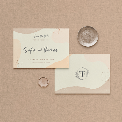 Wedding stationery flatlay of organic shape Sofia save the date card designed by The Little Paper Shop